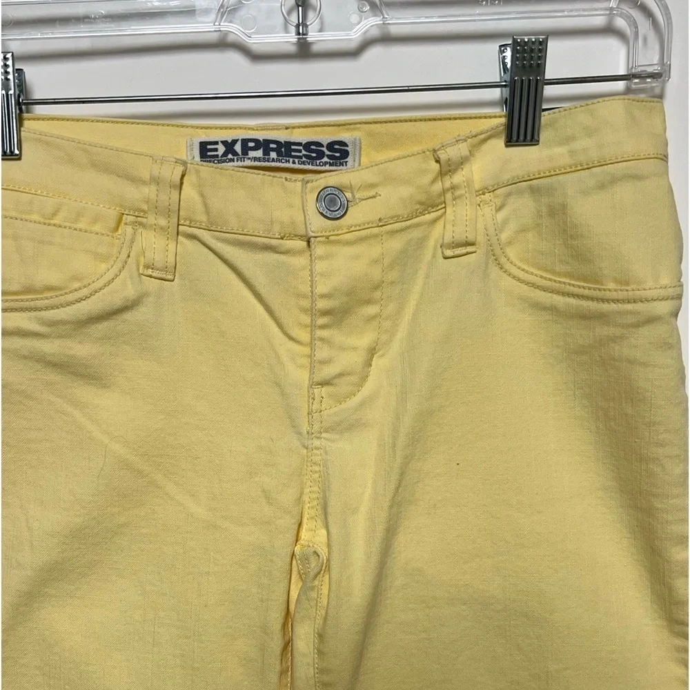 EXPRESS PRECISION FIT PALE YELLOW JEANS  SIZE 4